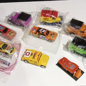 9 advertising cars and trucks (kelloggs?) 7 in original wrappings